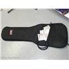 Image 1 : Gator Guitar Case with 9 Pkgs of Strings