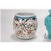 Image 2 : Three pieces of glazed pottery including hand painted bird and floral motif biscuit barrel, sans lid