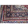 Image 2 : 100% hand made Iranian wool carpet "Tabriz" with center medallion, red background and highlights of