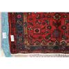 Image 2 : 100% hand made Iranian wool carpet "Zanjan" with center medallion, red background, stylized animals 