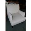 Image 1 : Ivory upholstered parlour chair with button tufted back, decorative nail heads and turned supports