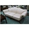 Image 1 : Antique Regency style full size sofa with decorative show wood, brass capped feet and Regency stripe