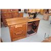 Image 1 : Antique treadle Peerless sewing machine in oak cabinet