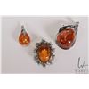 Image 1 : Three amber and silver/ plate pendants