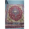 Image 1 : 100% hand made Iranian wool carpet Artist signed "Tabriz" with center medallion, red background and