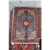 Image 1 : 100% hand made Iranian wool carpet "Tabriz" with center medallion, blue background and highlights of