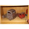 Image 1 : Shelf lot of vintage stamped tin toys including a crane and trucks, some marked Made by Lincoln