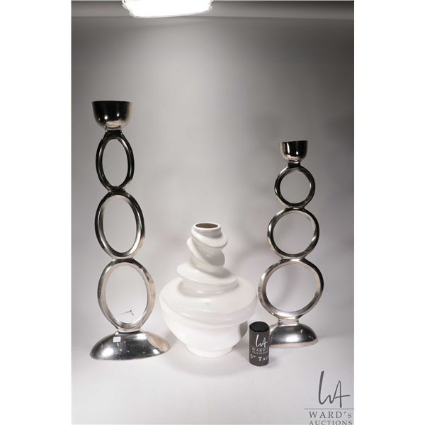 Selection of decorative decor including two aluminum candlesticks, 33" and 28" and a glazed art pott