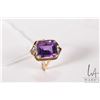 Image 1 : 14kt yellow gold ring set with emerald cut amethyst gemstone and two small accent diamonds, size 6.7