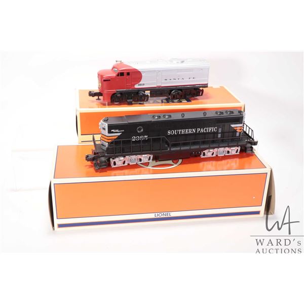 Two boxed Lionel O scale non- powered diesel locomotive including Sante Fe Alco A- Unit no. 6-18919 