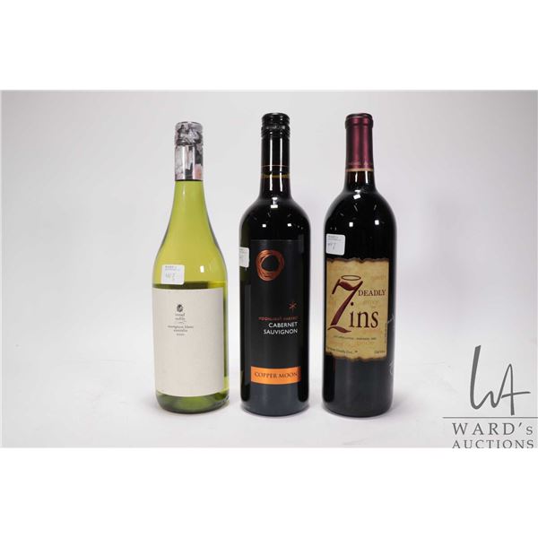 Three bottles of wine including Seven Deadly Zins 2005 Zinfandel, Copper Moon Moonlight Harvest Cabe