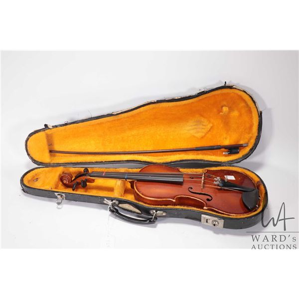 Violin marked " Copy of Stradivarus" Made in German 20 1/2", includes bow and fitted hard case