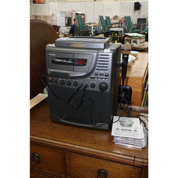 Venturer Karaoke machine, model # CDG-2 with five discs, working at time of cataloguing