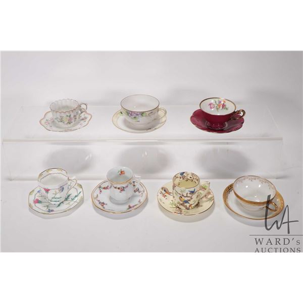 Seven porcelain demi cups and saucers including Grafton, Limoges, Nippon, Royal Doulton etc.