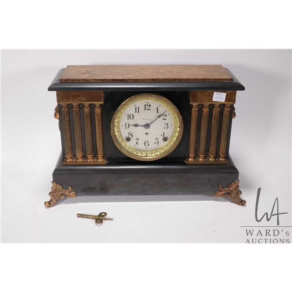 Mid 20th century Seth Thomas chiming mantle clock in "adamantine" case with Grecian column and lion 