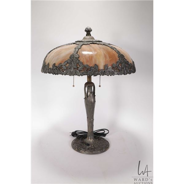 Cast and slag glass table lamp, 21" in height