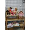 Image 1 : Selection of vintage dolls including Chatty Cathy with branded extra clothing, 1970's crawling doll,