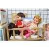 Image 2 : Selection of vintage dolls including Chatty Cathy with branded extra clothing, 1970's crawling doll,