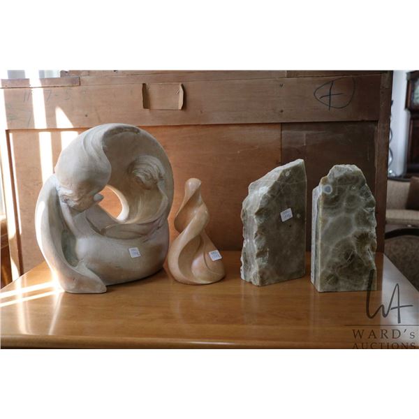 Austin sculpture " Beginnings" 12" in height, limited edition sculpture by Lortie 2/25 and a pair of