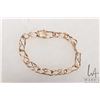 Image 1 : 10kt yellow gold 8" charm bracelet