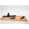 Image 1 : Carved soapstone display of hunter in kayak w/ seal & whale. Kayak measures 9 1/2" long. No signatur