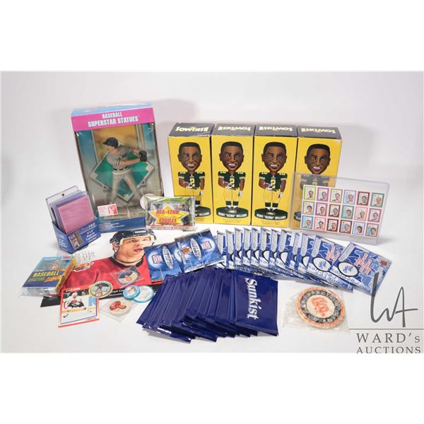 Selection of sports collectibles including cards, four Henry "Gizmo" Williams bobble heads, Don Matt