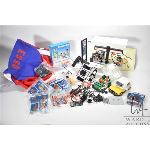 Playmobil Esso service station set and sports bag. Plus 5 Playmobil figure sets in box