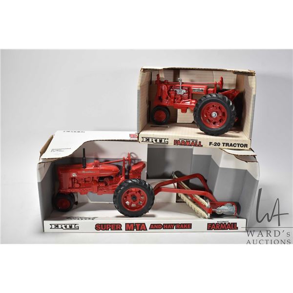 Two Ertl 1:16 scale die cast toys including Super M-TA Farmall and Hay Rake and a Farmall F-20 tract