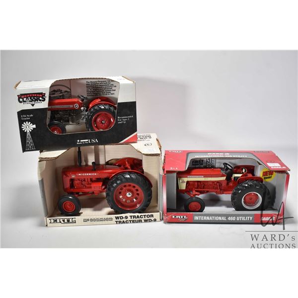 Three Ertl 1:16 scale die cast toys including Massey-Ferguson 135, International 460 Utility and McC