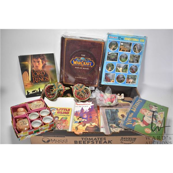 Selection of children's books and toys including 3 large Golden books, Cutout books, animation books