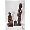 Image 1 : Two carved wooden figures including woman w/ two children measuring 23" high and woman w/ basket mea