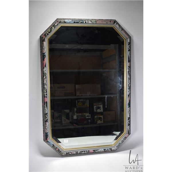 Modern framed mirror measuring 38" x 25". NOTE: This Lot Is Not Available For Shipping. Local pickup