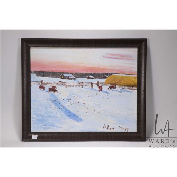 Framed acrylic on canvas painting of a feeding cows in a winter setting, signed by artist Allen Sapp