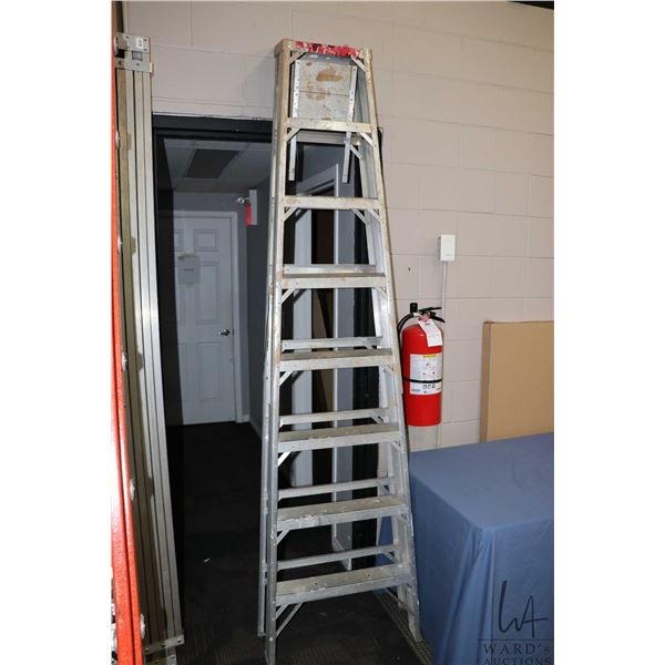 Eight foot aluminim step ladder with paint tray. NOTE: This Lot Is Not Available For Shipping. Local