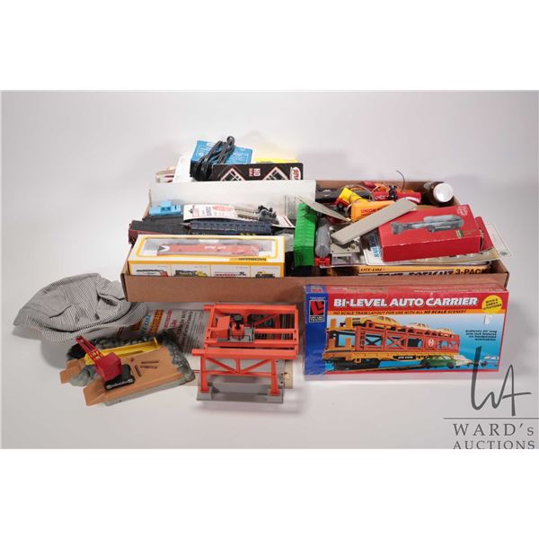 Large selection of HO gauge trains including rolling stock, power supply, signals, track, hat, engin