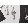 Image 2 : Three pieces of sterling silver jewellery including 16" necklace with key pendant, helmet pendant on