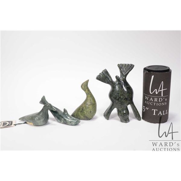 Four Inuit soapstone carvings including bird by Mabel Amiganiuik, Coppermine, with original Eskimo A