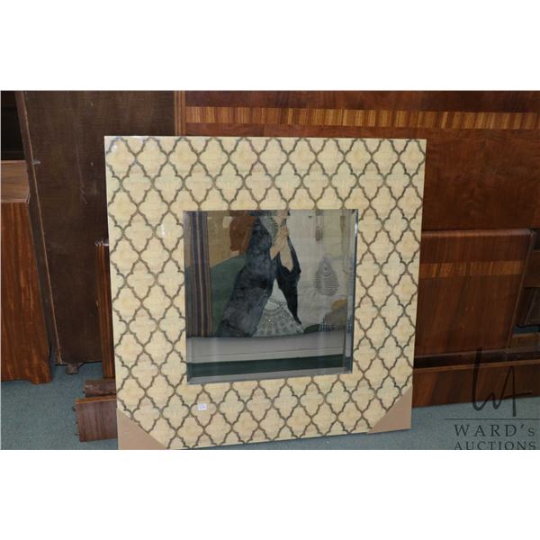 Framed wall mirror in hi-gloss faux marble frame, 36" X 36". NOTE: This Lot Is Not Available For Shi