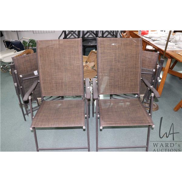 Four folding patio chairs with metal frames