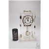 Image 1 : German made Anniversary clock in acrylic case, note: keeping time but chime not working