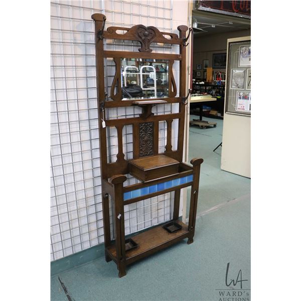 Antique oak hall stand with decorative bronze hooks, Nouveau carving and metal panel, glove box, dri