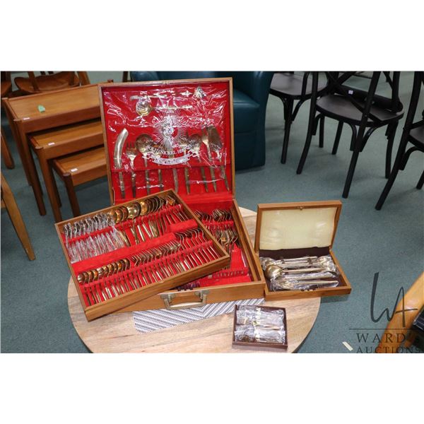 Large boxed set of solid nickel bronze flatware with place settings for twelve plus serving pieces a