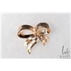Image 1 : Ladies 14kt yellow gold bow pin