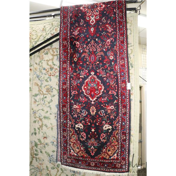 100% hand made Iranian wool carpet "Nahaband" with multiple borders, navy blue background, floral de