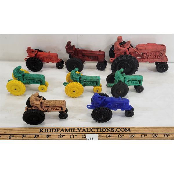 LOT OF 7 - RUBBER TOY TRACTORS - INCL AUBURN