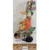 Image 4 : WIND-UP TOY DUCK RIDING A TRI-CYCLE 