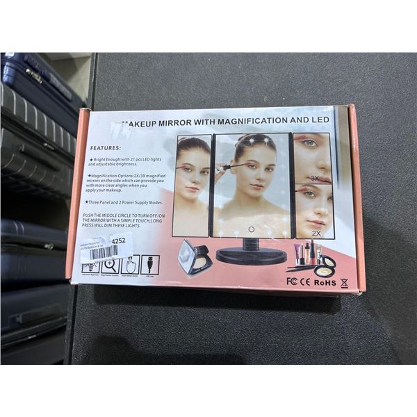 LED makeup mirror with magnified mirrors