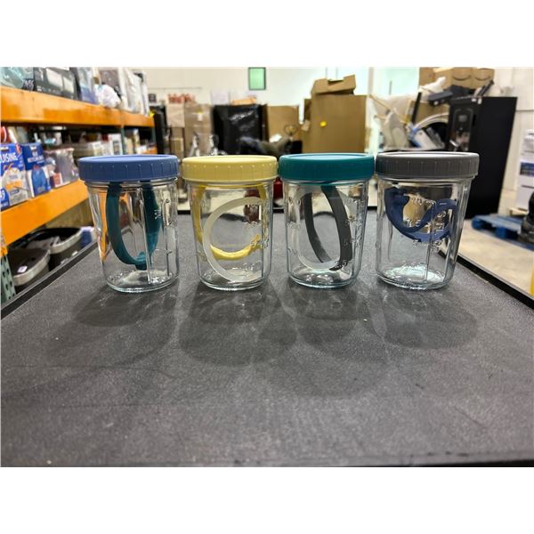 Lot of 4 Rubber Top Storage Jars