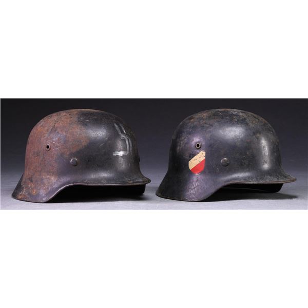 2 WWII GERMAN LUFTWAFFE HELMETS.