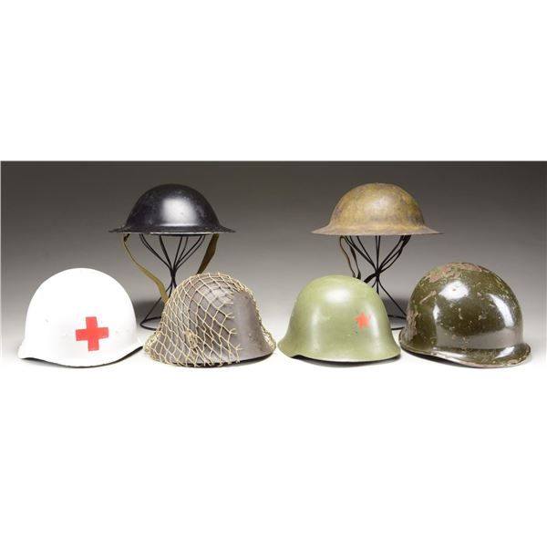 6 MILITARY HELMETS.